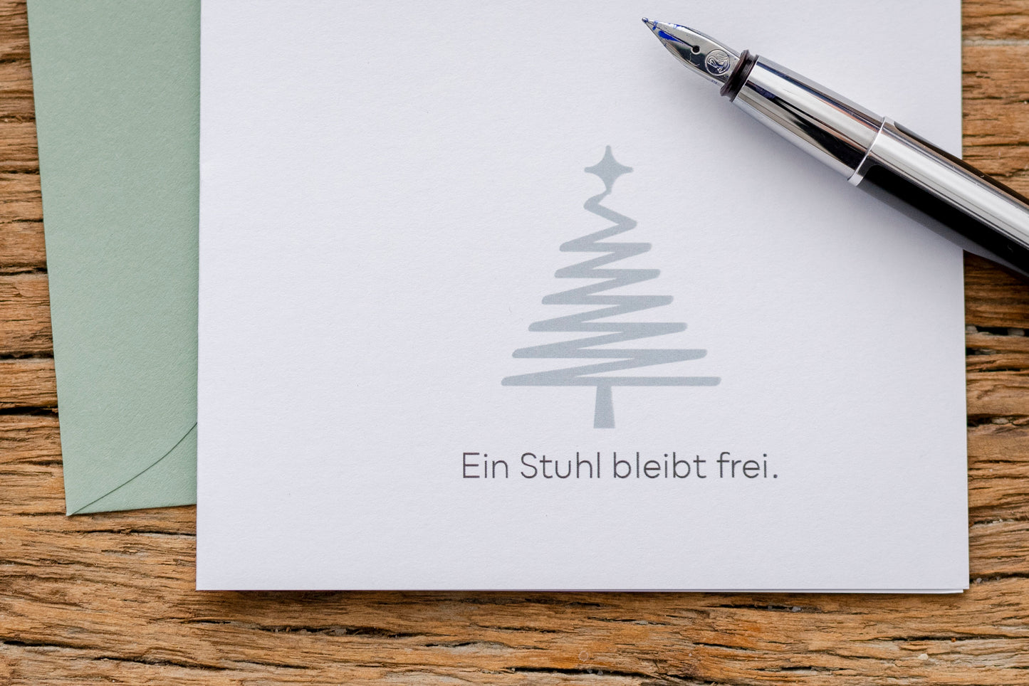 Gedenkkarte: "Ein Stuhl bleibt frei"